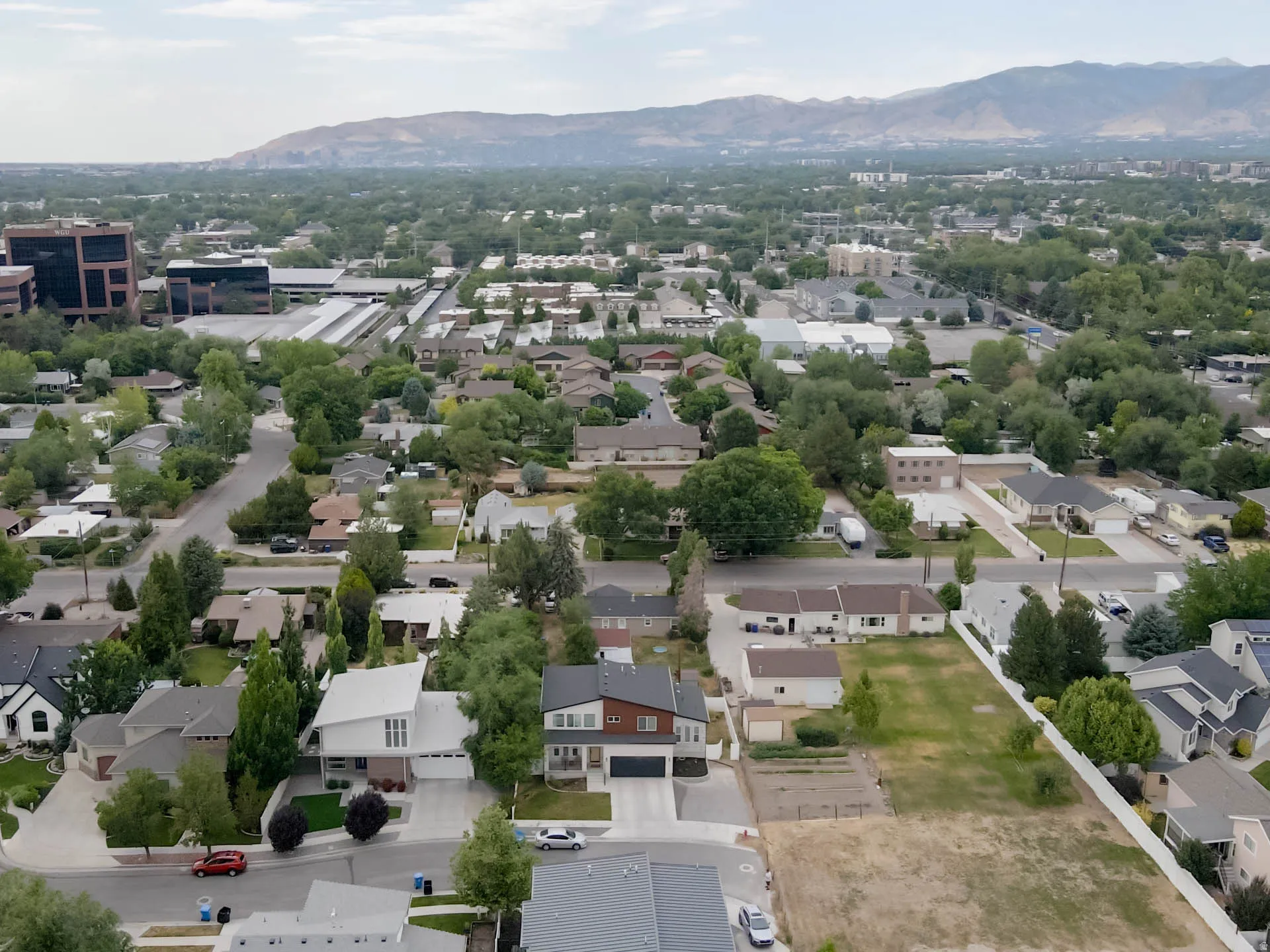 Aerial perspective showcasing a residential neighborhood with varied architectural styles