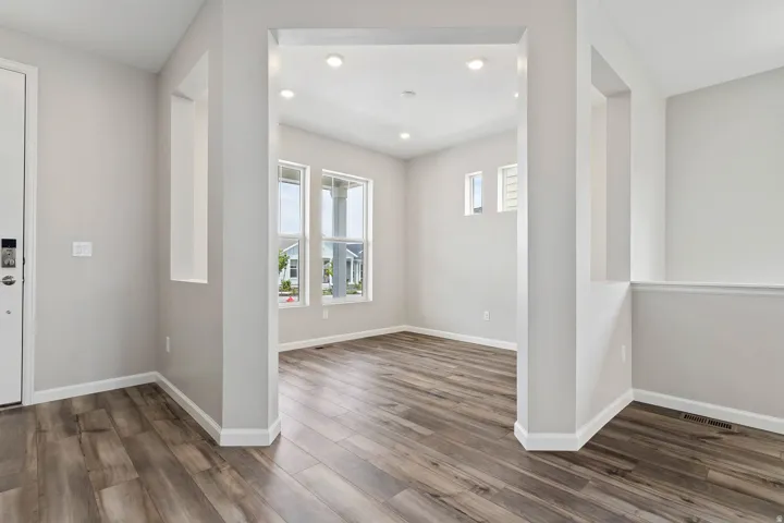 Entryway featuring wood-finish flooring and a bright interior