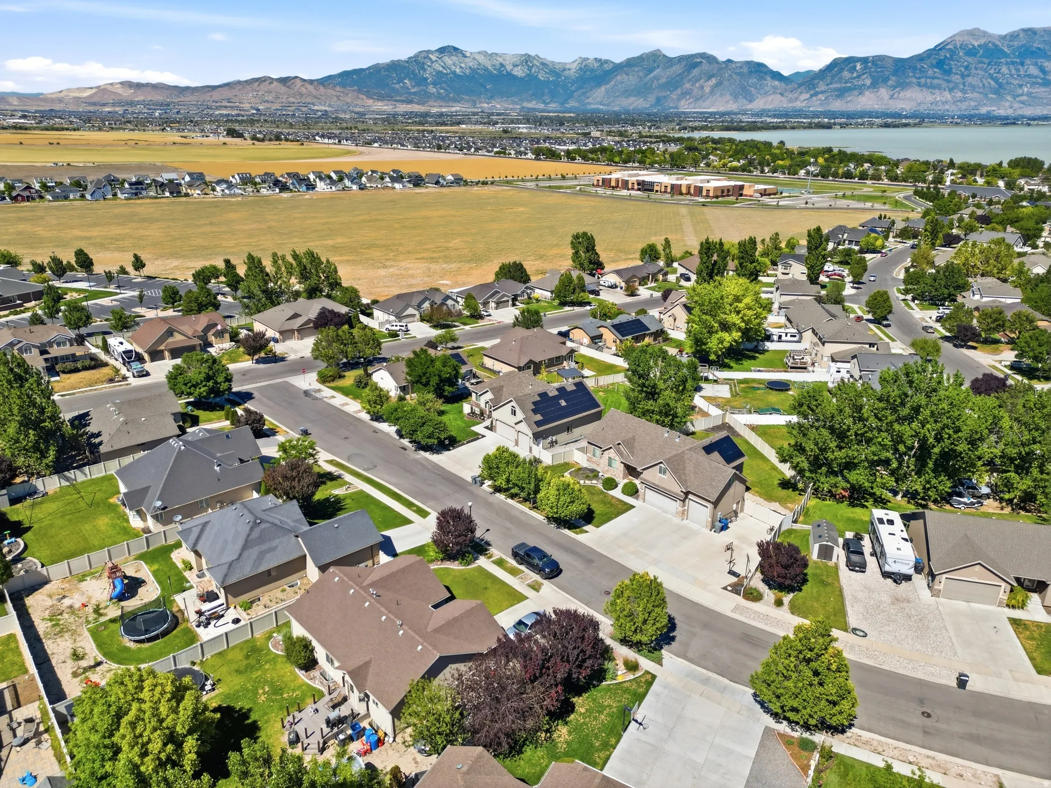 Aerial perspective showcasing a residential neighborhood with varied home styles