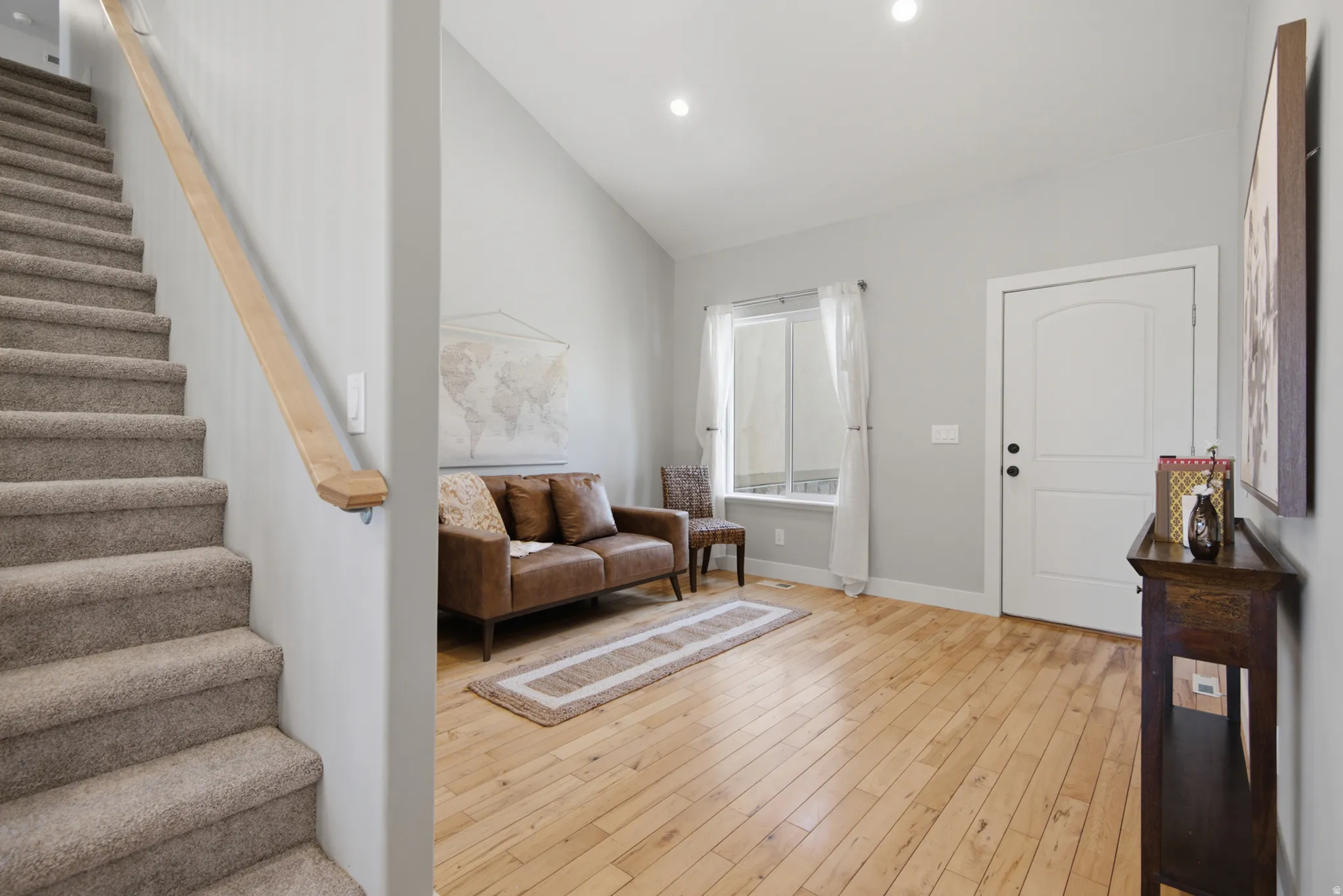 Light wood-finish flooring complements the interior wall color