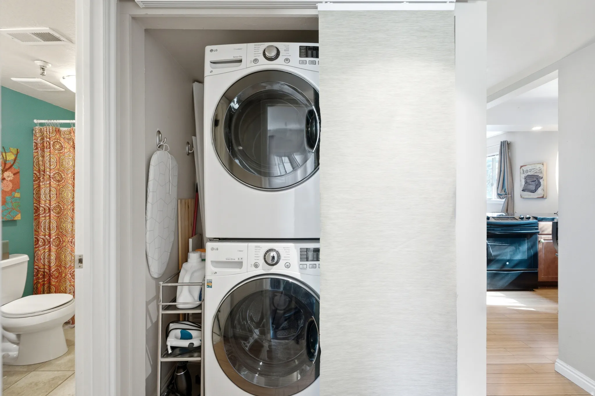 Stacked front-load washer and dryer units