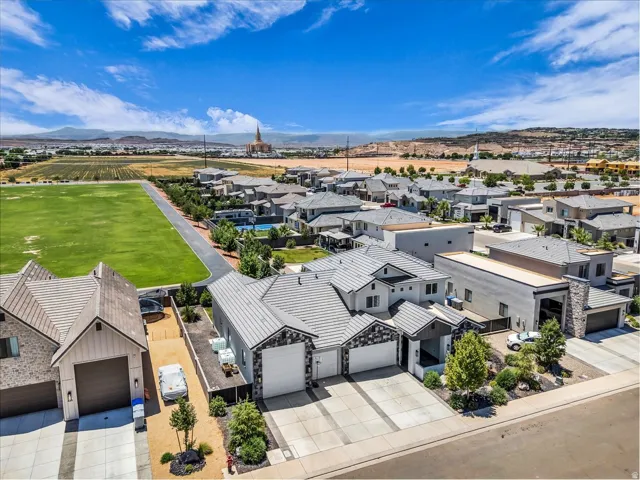 Modern residential community featuring varied architectural styles and mature landscaping