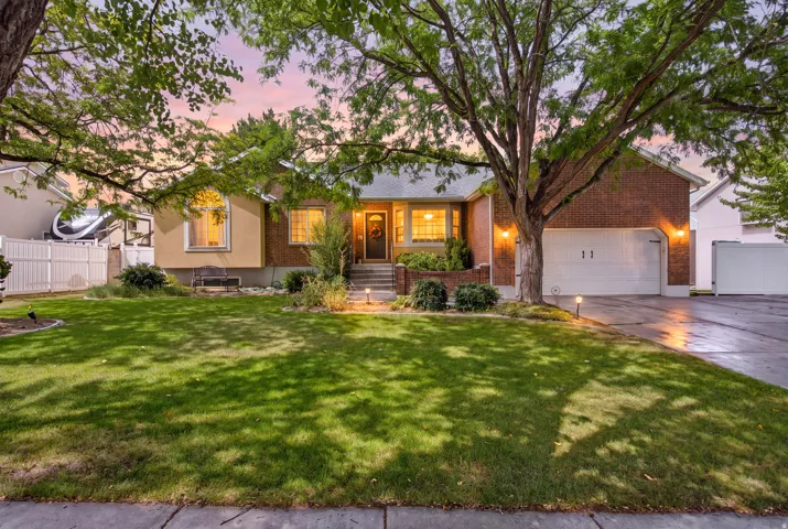 Brick and stucco exterior with a two-car garage