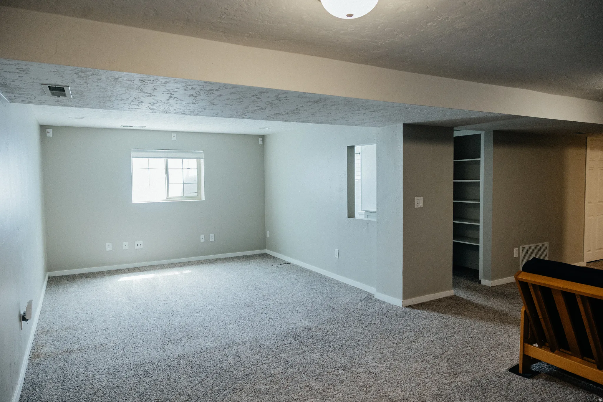 This expansive "L" shaped family room is such a great feature in this home.  It is large enough for a game table and a sectional.