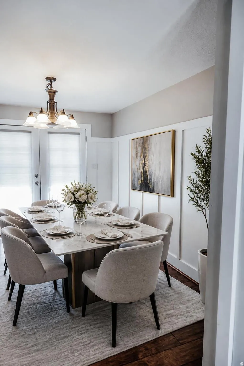 The board and baton in this dining room really highlights the space. The French doors to the back yard are not only convenient but allow lots of natural light.
