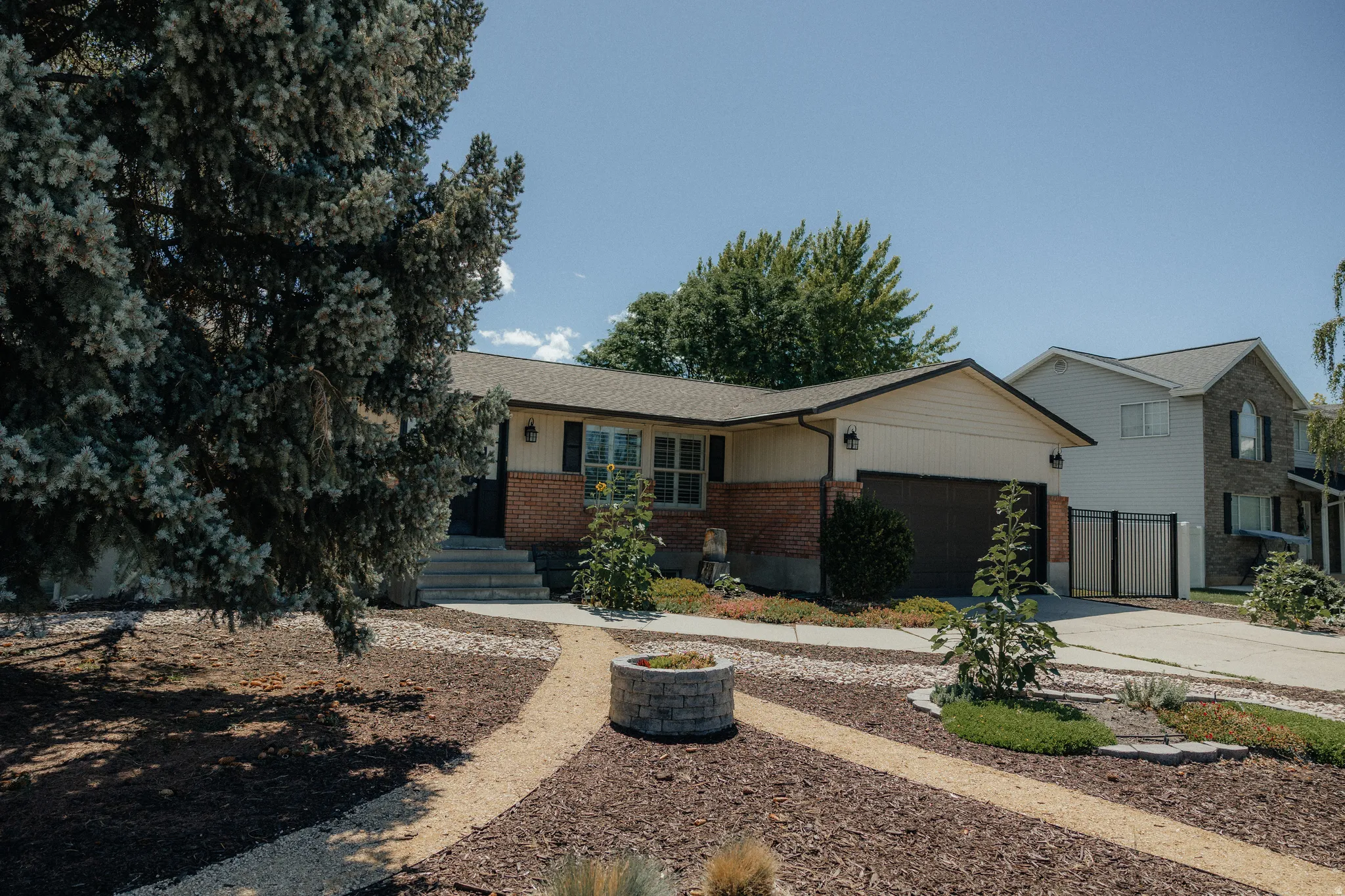 Take back your weekends with this low maintenance, low water need, attractive front yard.