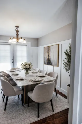 The board and baton in this dining room really highlights the space. The French doors to the back yard are not only convenient but allow lots of natural light.