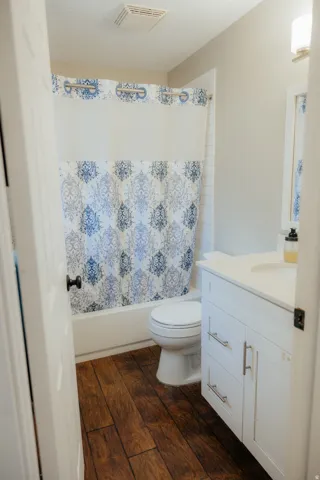 The ensuite bathroom is cheery and bright.
