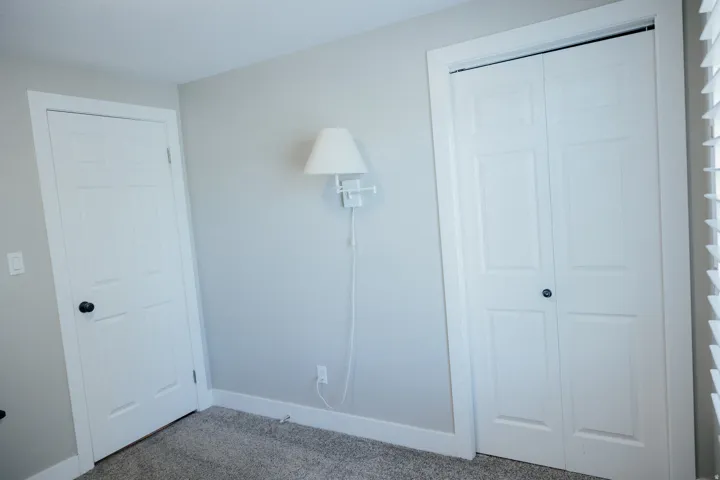 Bedroom 3 also sits at the front of the home and boasts plantation shutters.