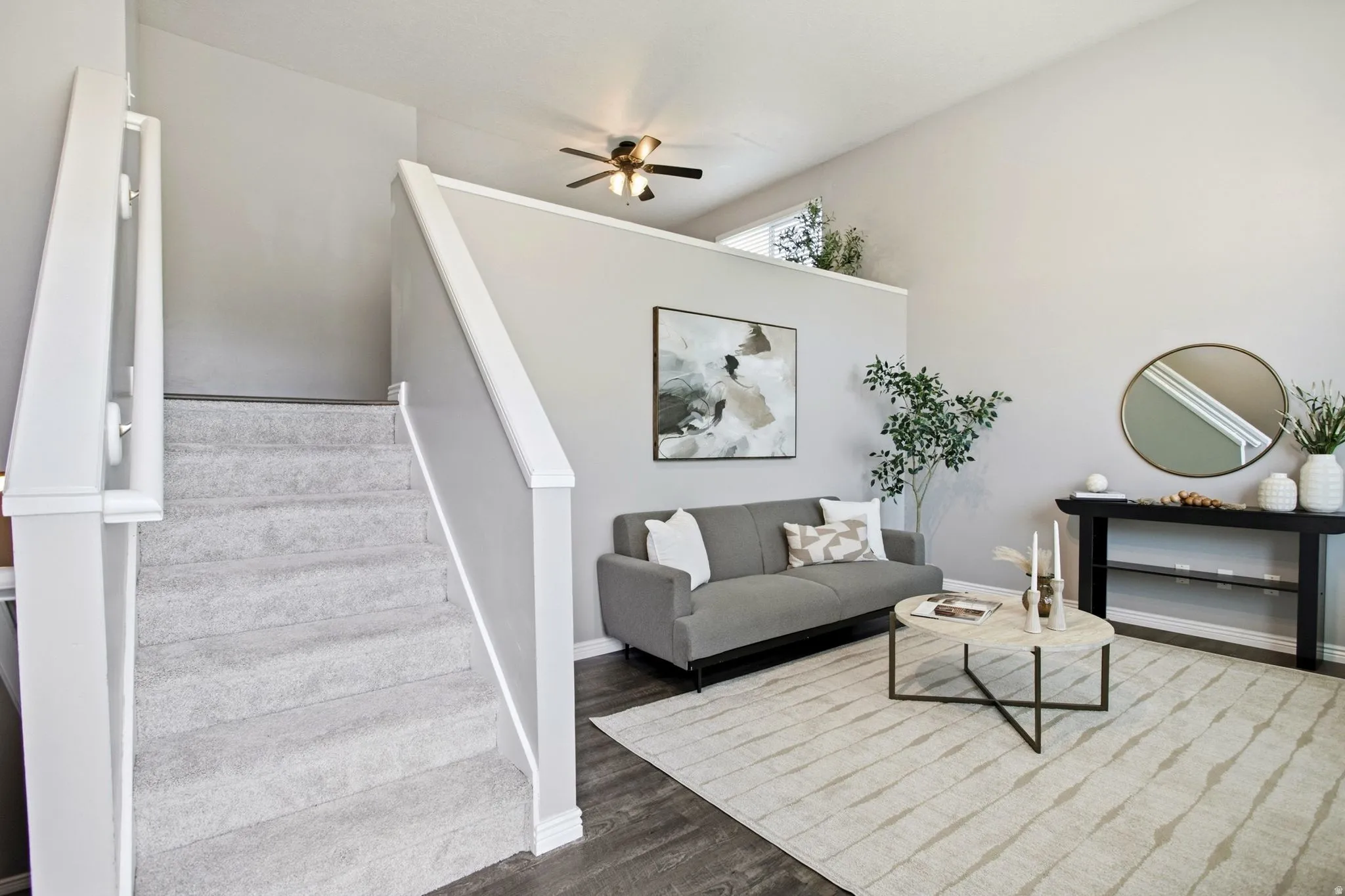 Wood-finish flooring, vaulted ceilings, and a ceiling fan