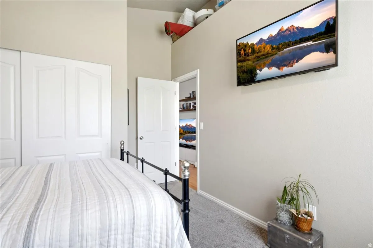 Recessed closet with white bi-fold doors