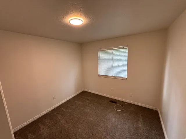 Neutral tone wall finishes with matching trim