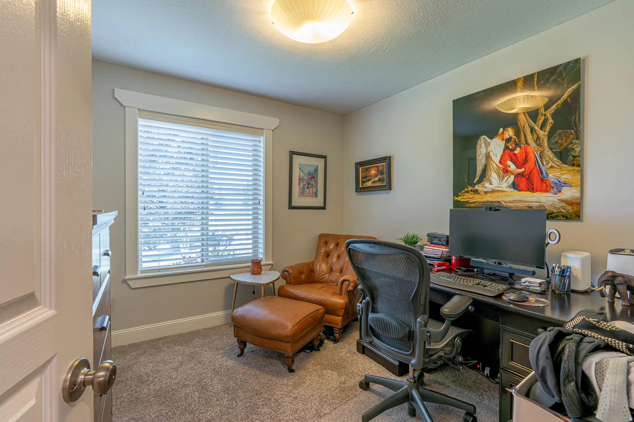 First floor bedroom currently being used as an office space.