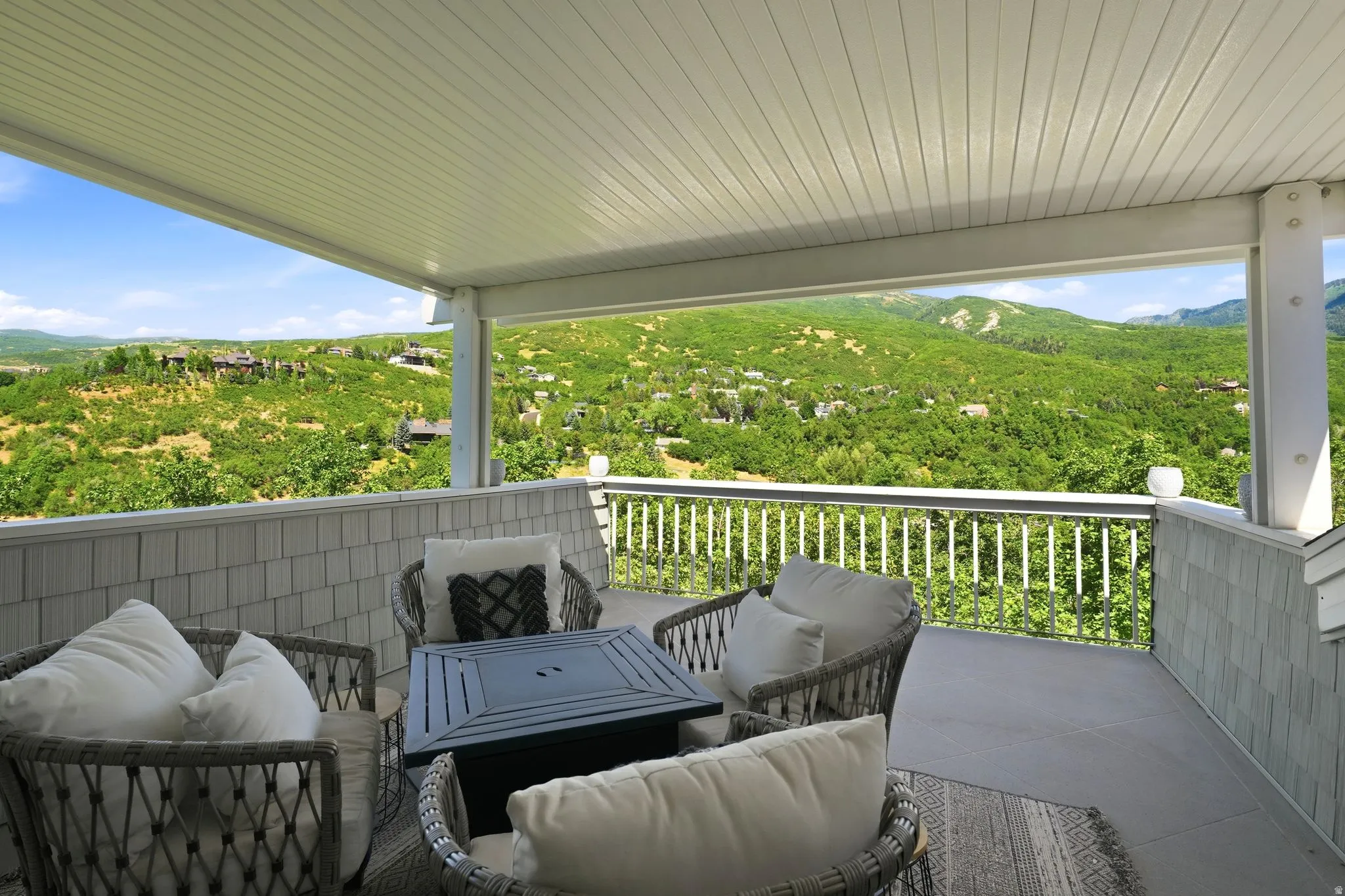 Master Private Deck Sitting Area, Covered patio featuring a slatted ceiling and white railing