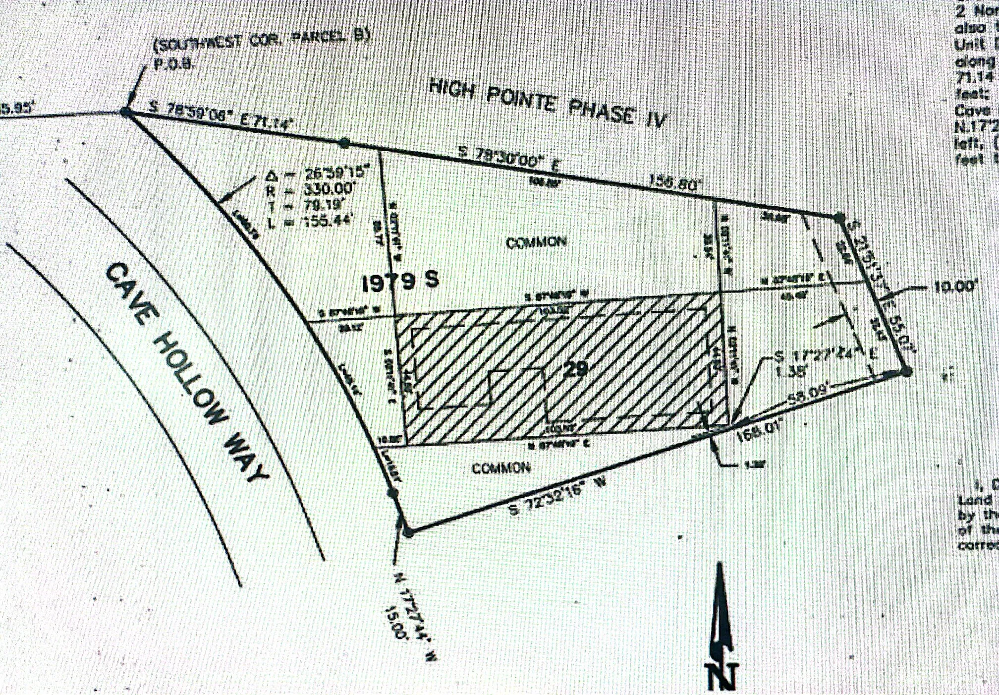 Plat Map measures apx (due to curve) .41 acres of land that surrounds this home.  The property has .11 acres deeded to it in which property taxes are paid and the surrounding .30 acres that is owned by the HOA is paid for through HOA dues, but enjoyed by