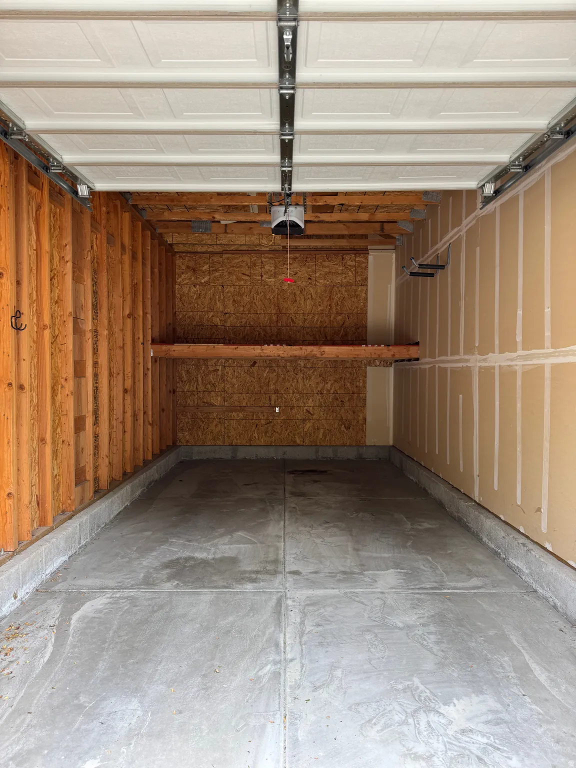 Extra deep and extra high detached garage provides both parking and storage