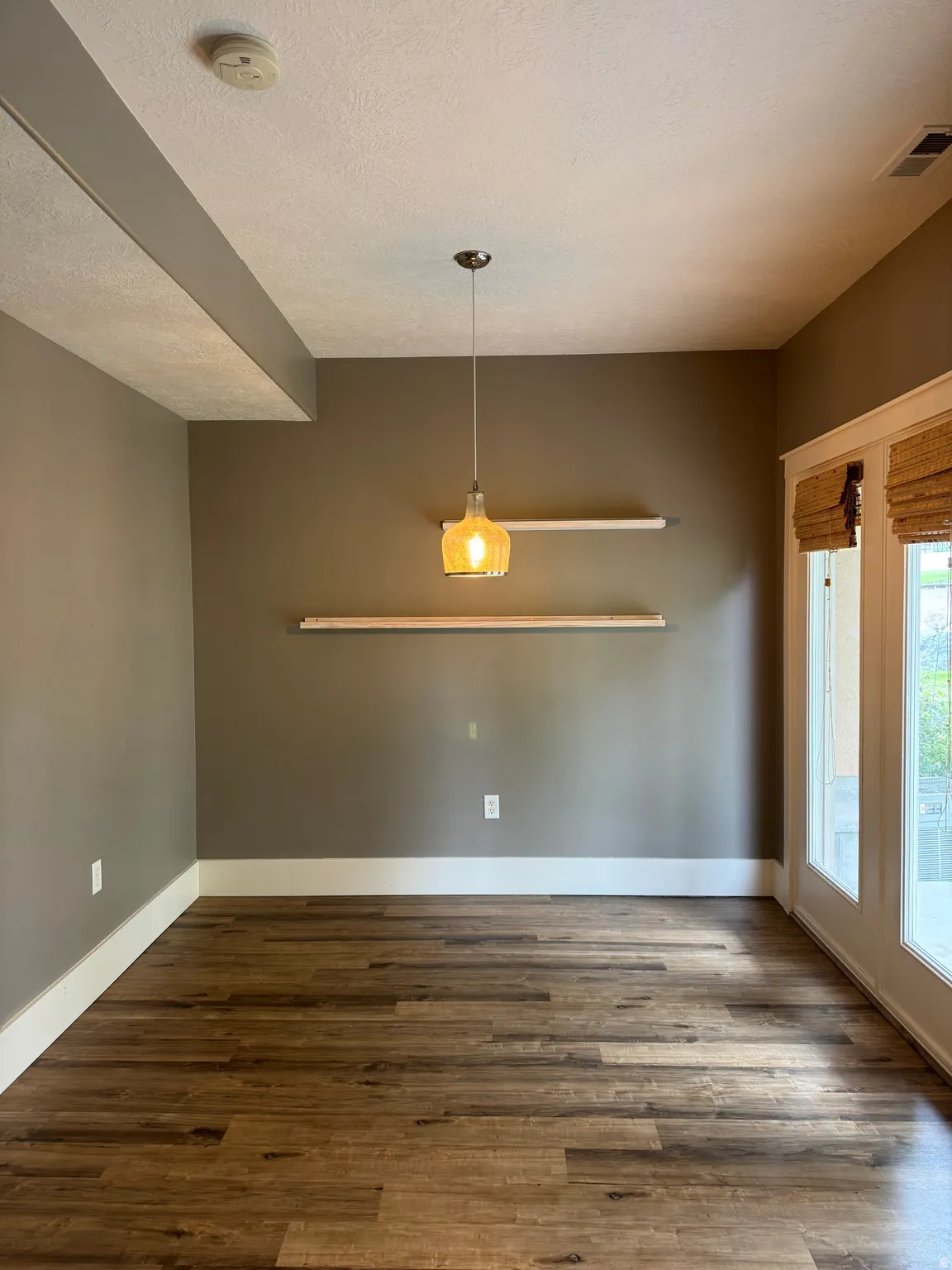 Dining Area with upgraded pendant light and LVP flooring