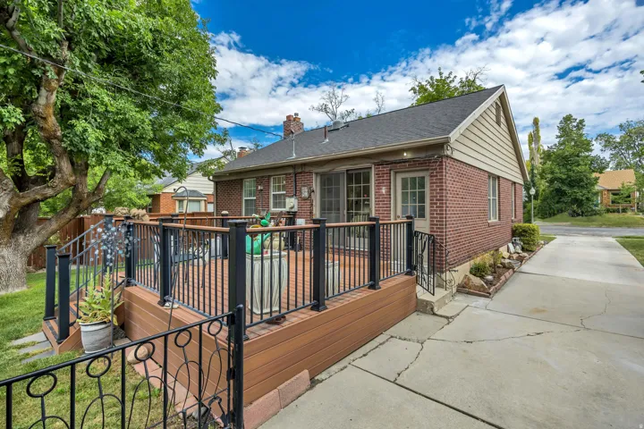 Spacious composite deck with black metal railings