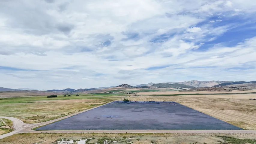 Expansive land parcel with surrounding agricultural fields