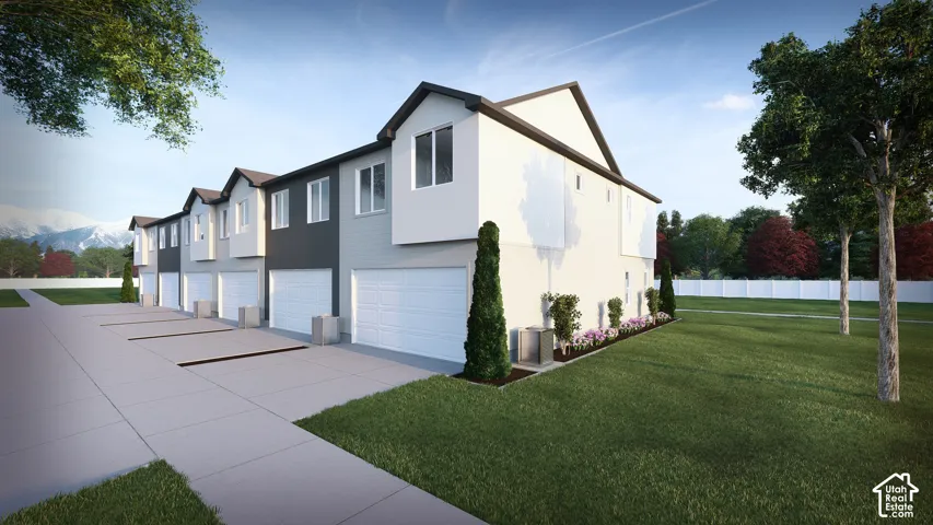 Modern multi-unit property featuring a clean-lined facade with contrasting light and dark paneling