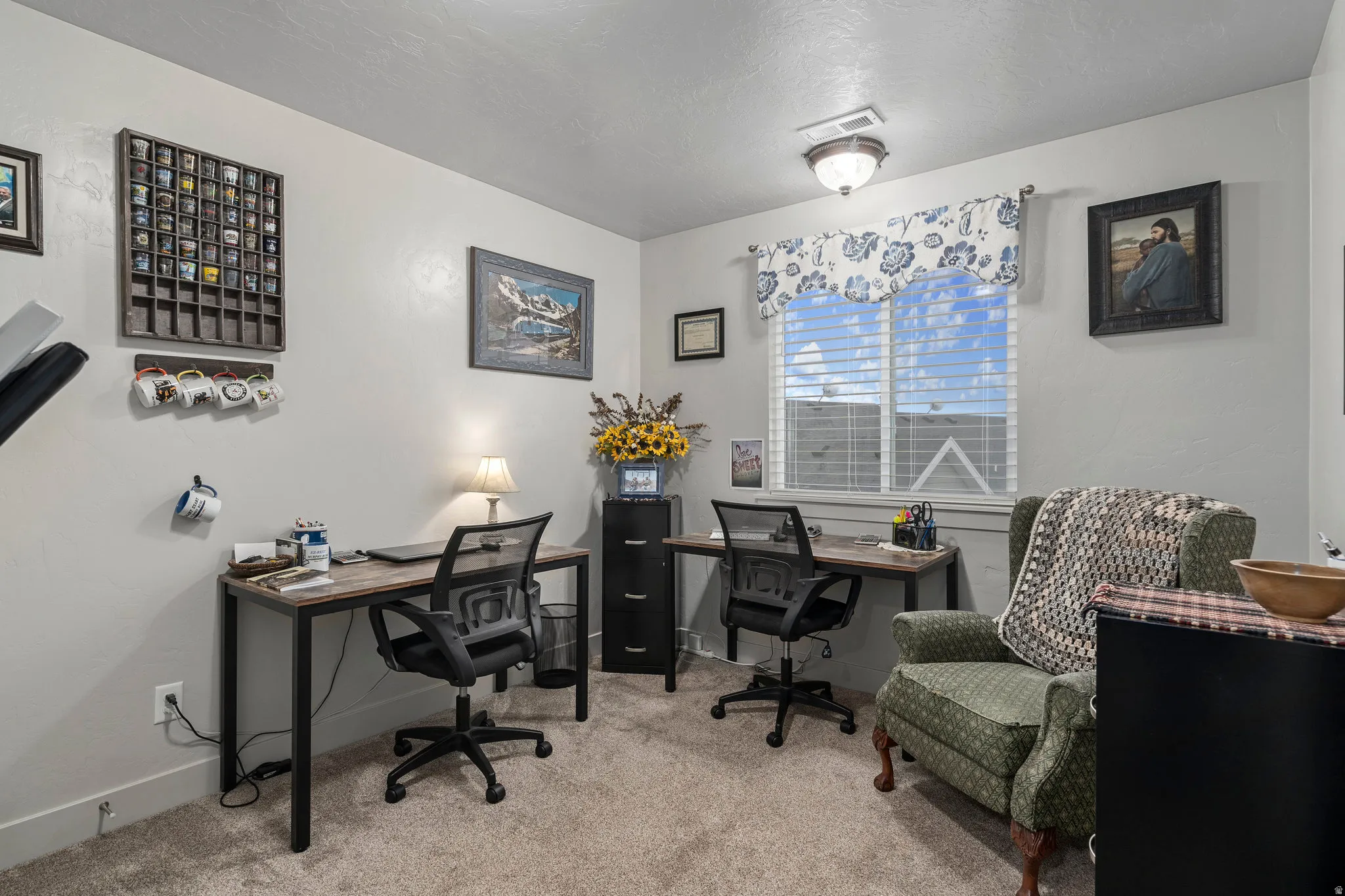 Versatile room featuring light grey walls, a window with blinds, and recessed lighting
