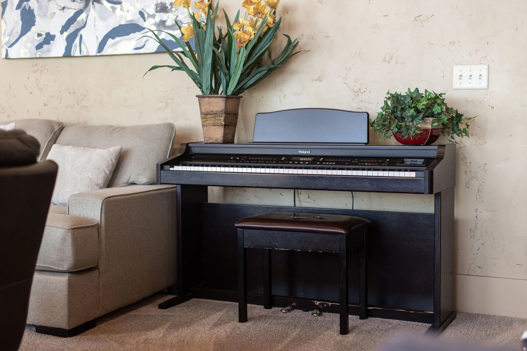 Textured wall finish provides a subtle backdrop to the living area