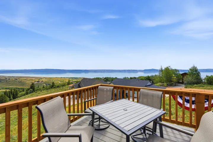 Exterior deck with composite flooring and wood railing