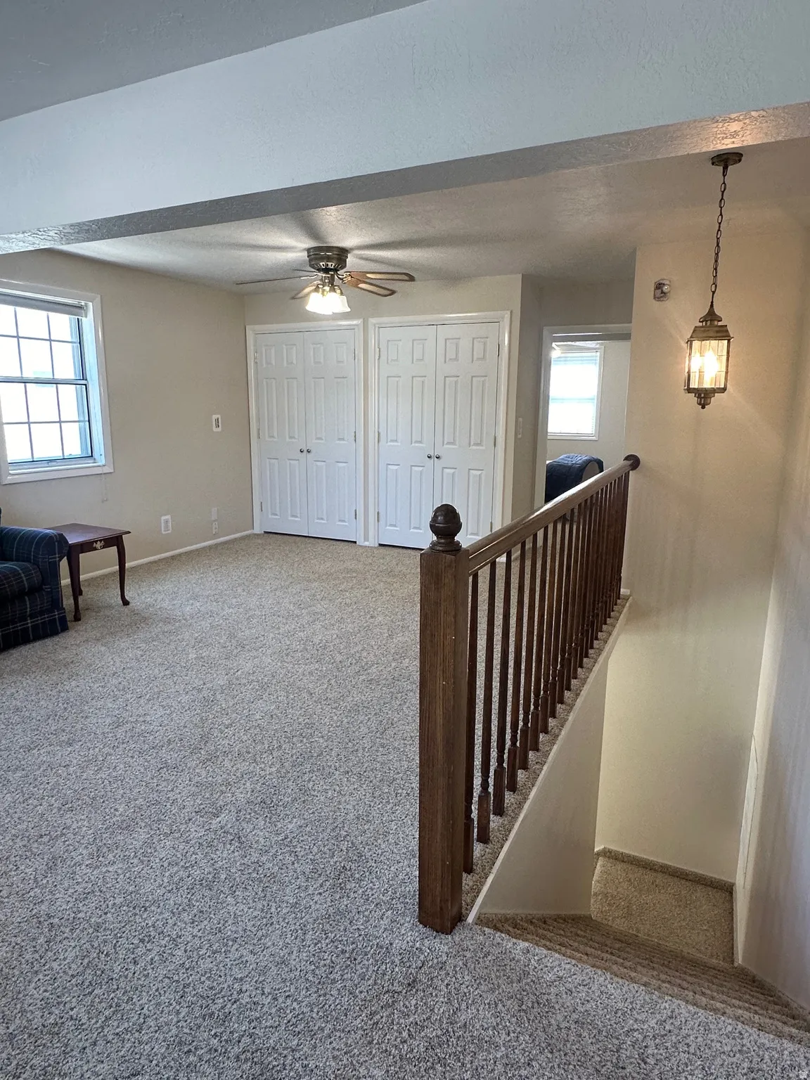 Landing opening to the upstairs family room.