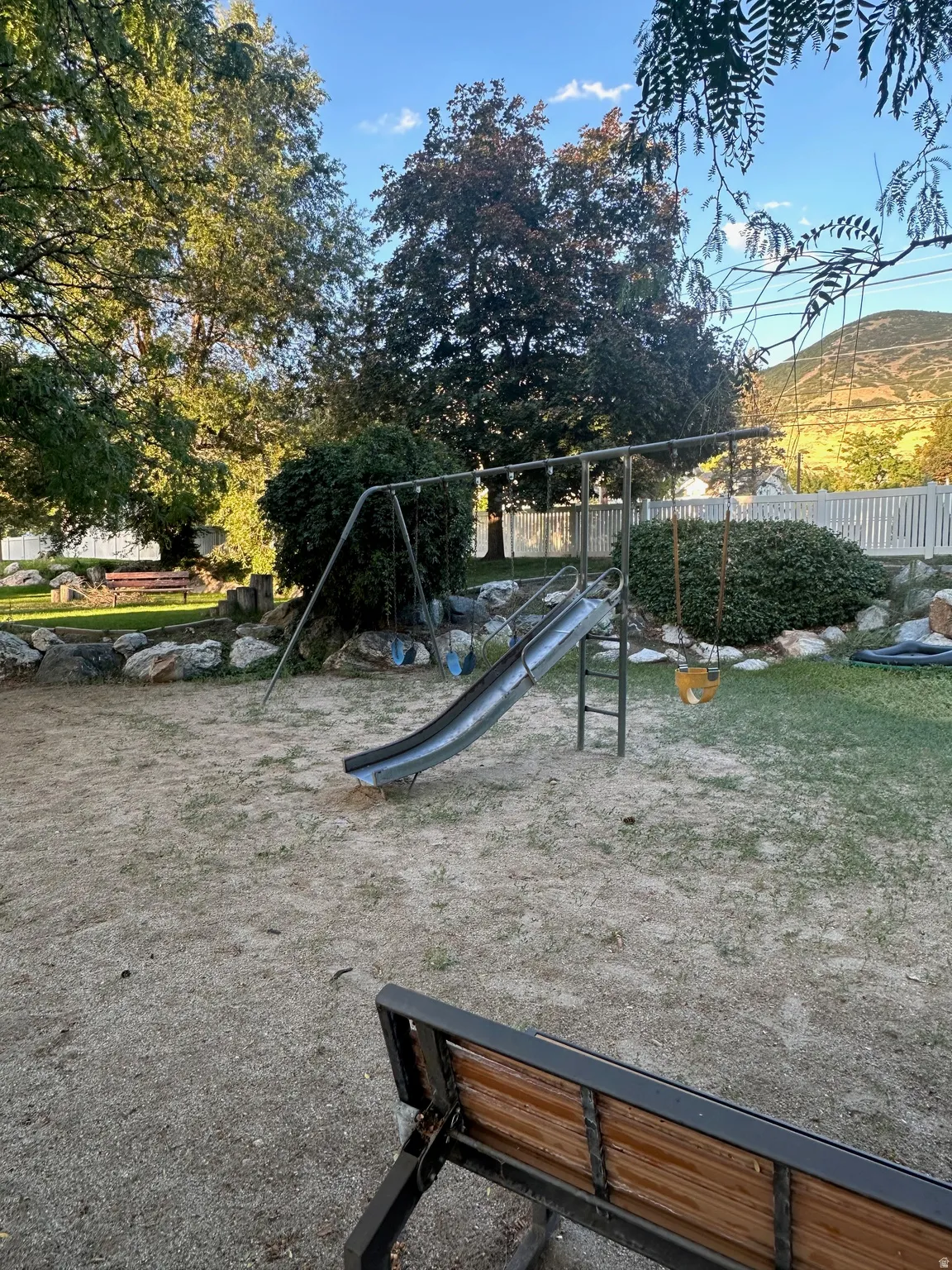 One of the playgrounds with a swing set.