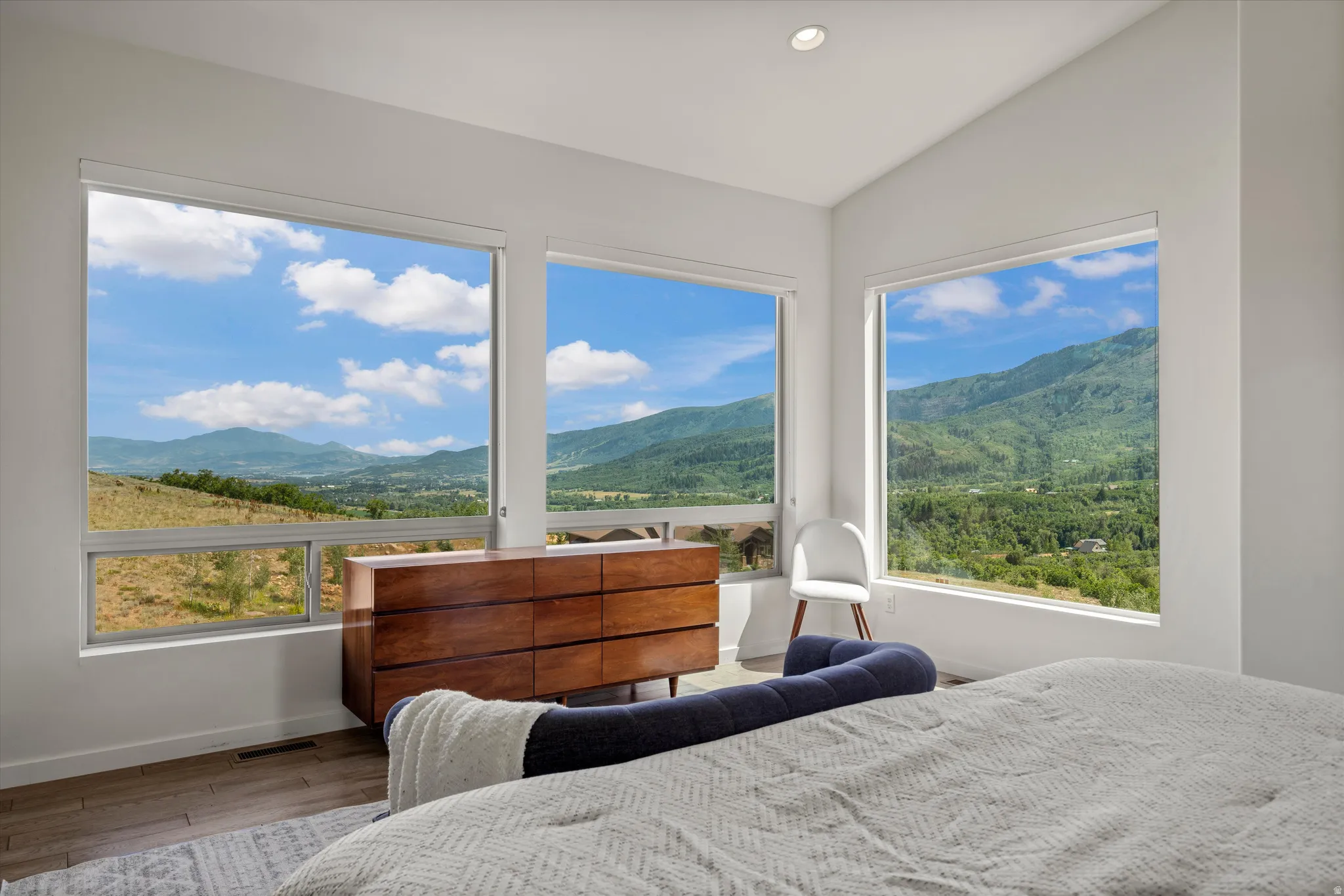 Expansive windows showcasing mountain scenery