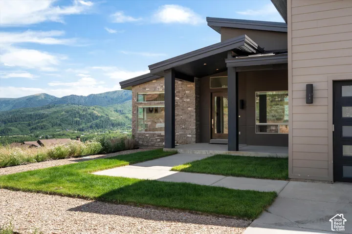 Modern architectural design featuring stone and horizontal siding