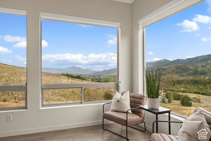 Expansive windows showcasing mountainous terrain
