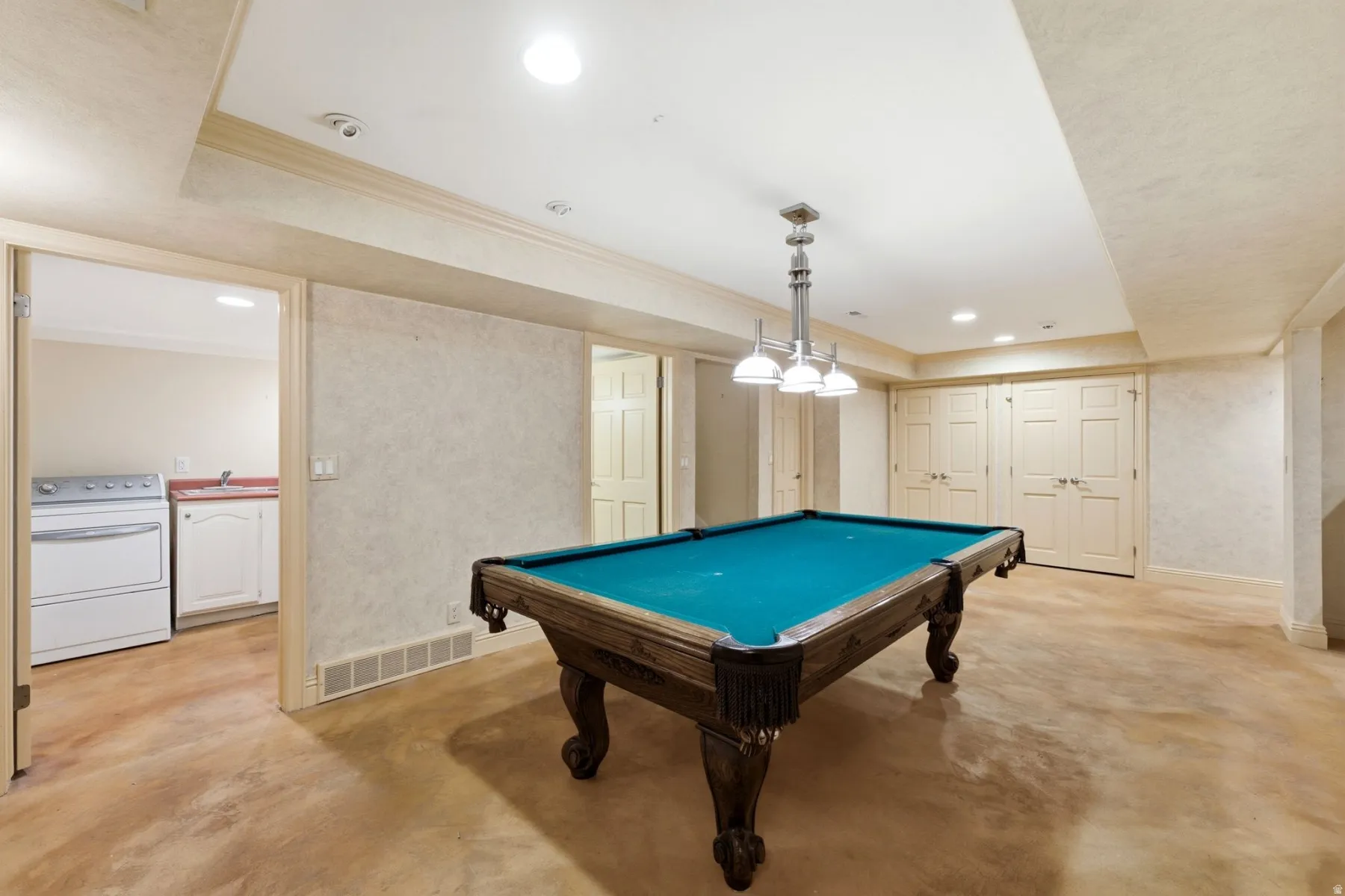 Recessed lighting, wood-finish flooring, and built-in storage closets