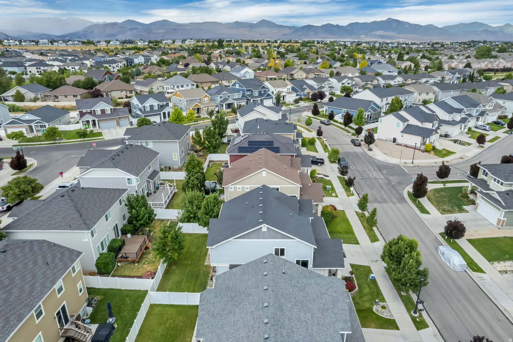 Aerial perspective showcasing a residential neighborhood with a variety of single-family homes