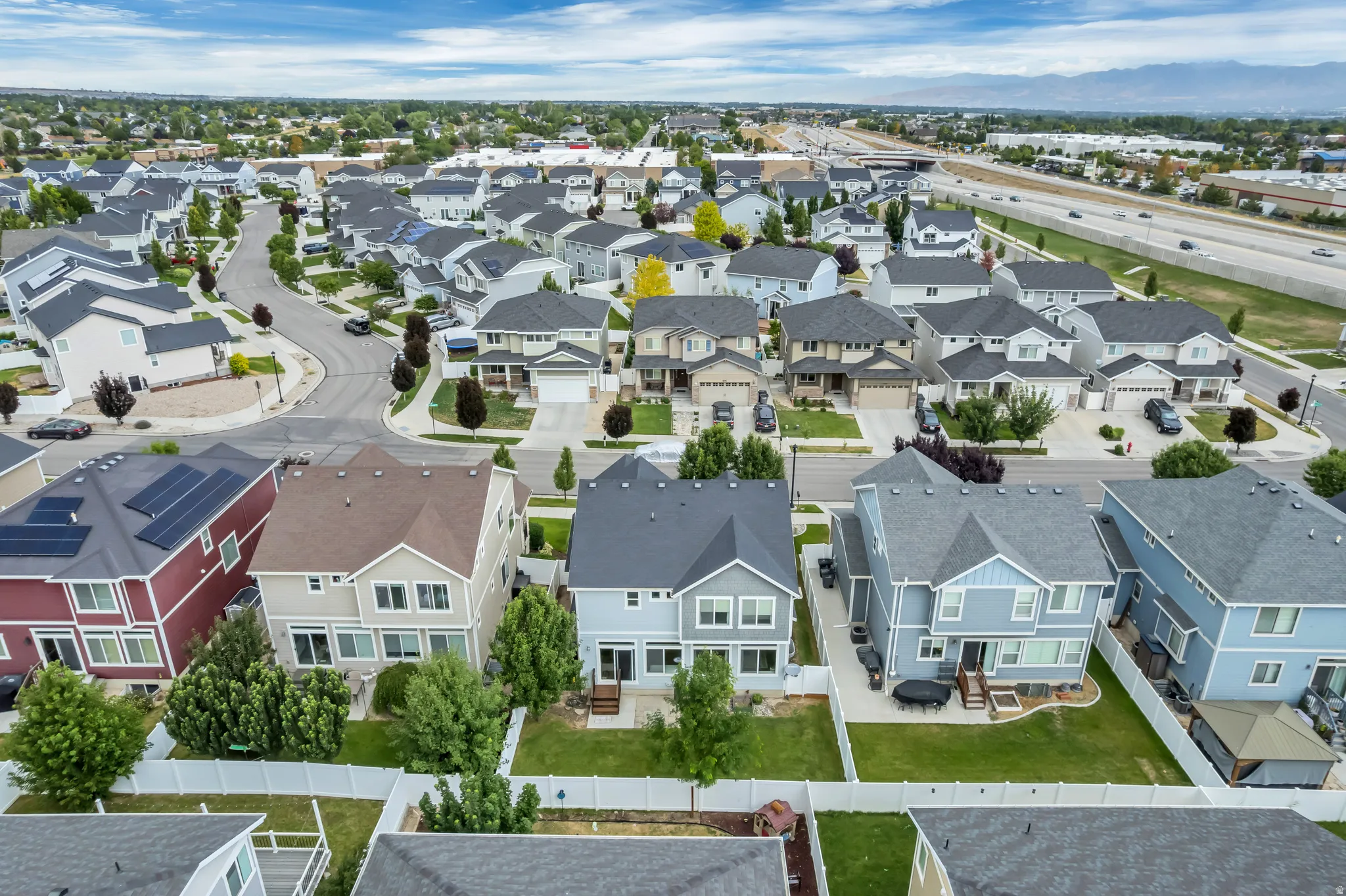 Aerial perspective showcasing a residential development with varied architectural styles