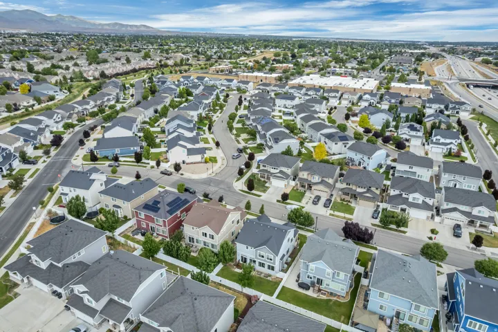 Aerial perspective showcasing a residential development with varied housing styles