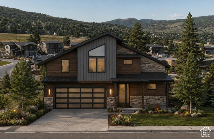Contemporary residence featuring stacked stone and wood-panel siding