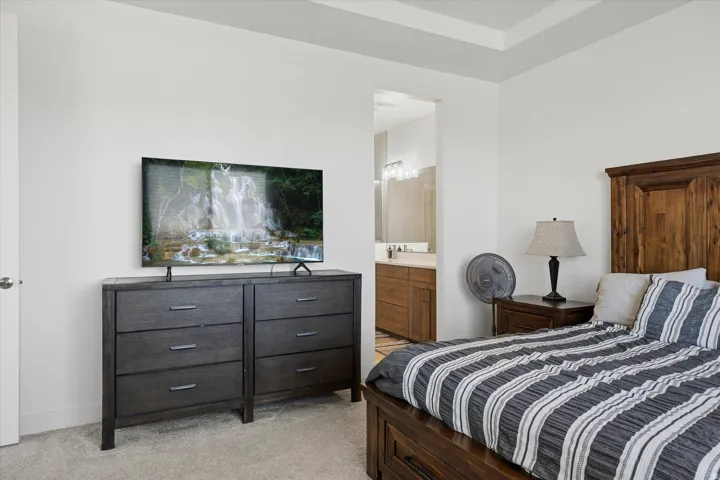 Recessed ceiling detail and wall-to-wall carpeting