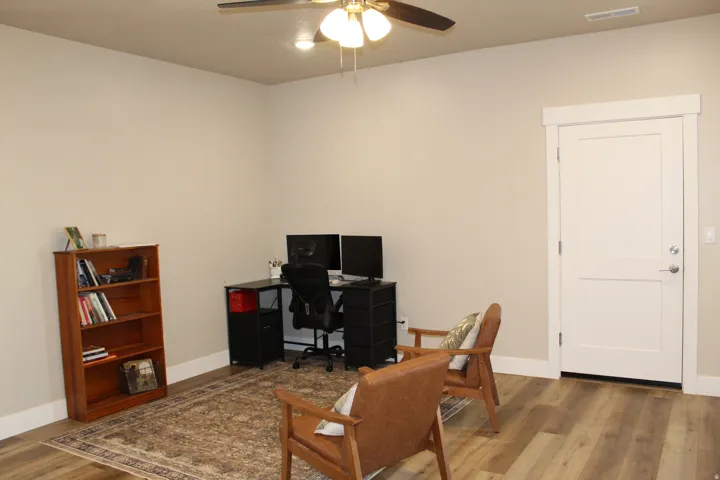 Neutral wall paint complementing wood-finish flooring