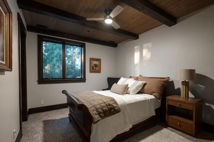 Vaulted wood-finish ceiling with exposed beams