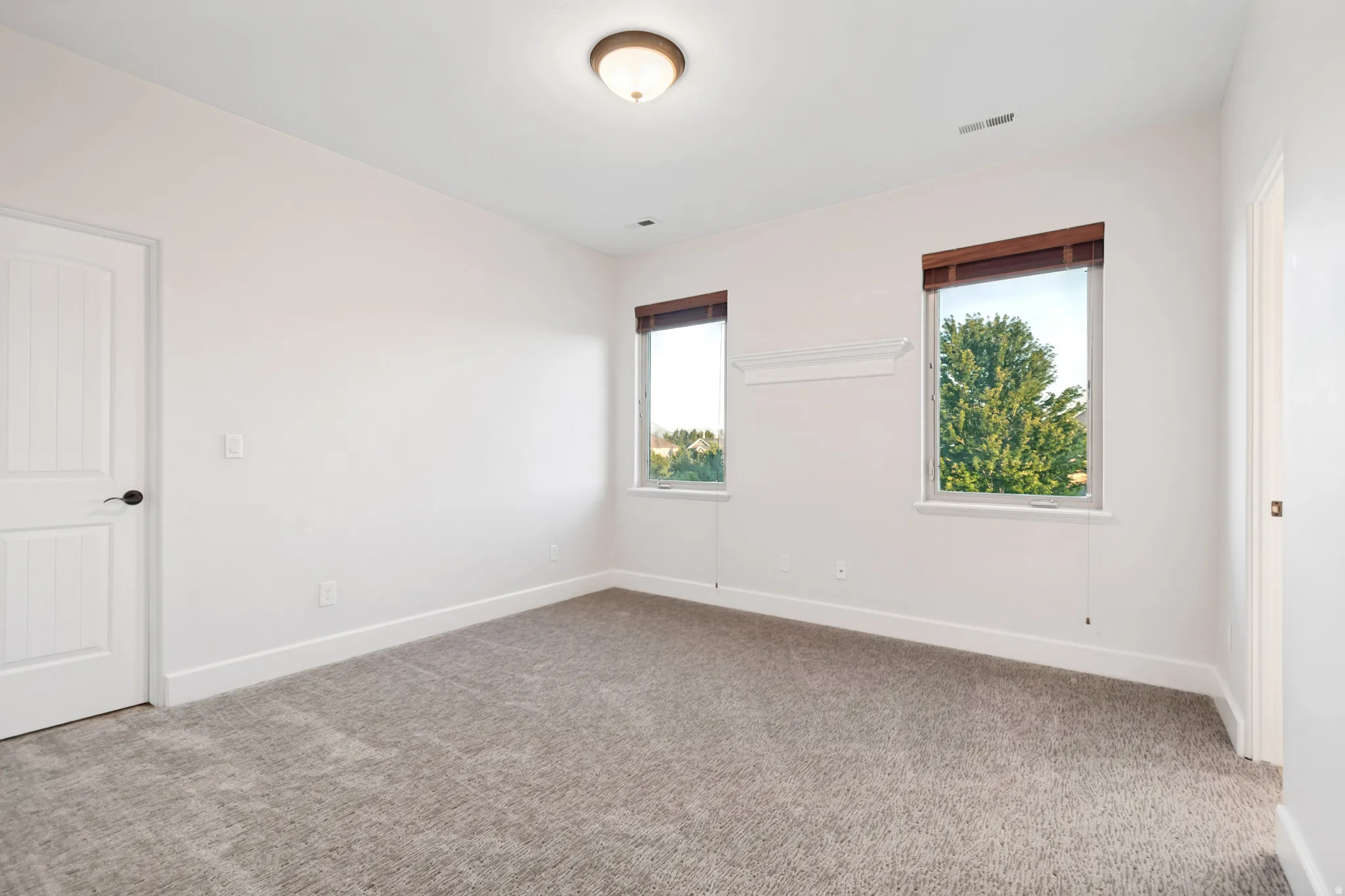 Upstairs bedroom #2 with closet.