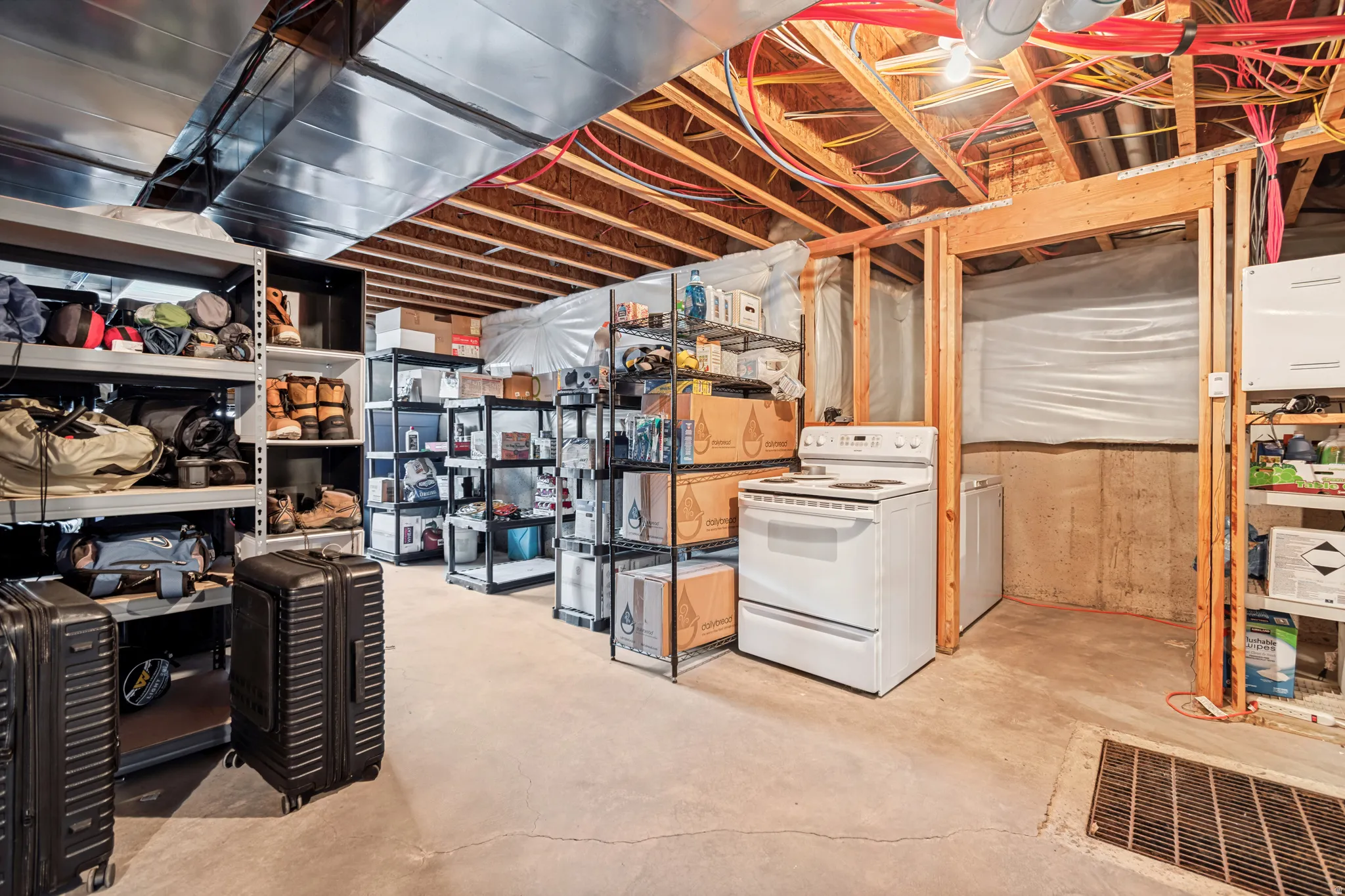 Spacious unfinished basement providing additional storage and ready to be finished for additional bedrooms, living rooms, bathrooms, or to be converted into an ADU or Mother-in-Law apartment.