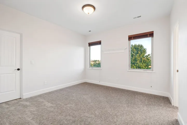 Upstairs bedroom #2 with closet.