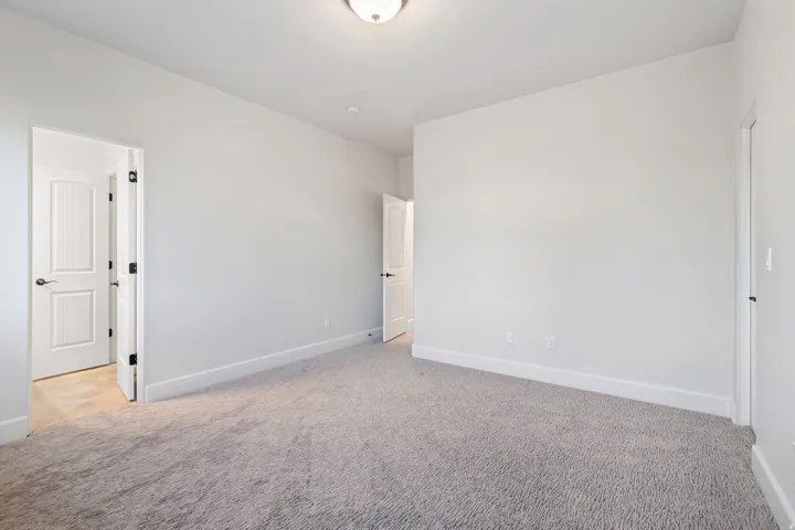 Spacious upstairs bedroom #2 with private access to Jack and Jill bathroom.