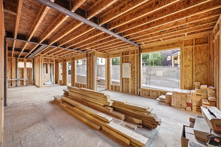 Exposed wood framing with structural steel beams