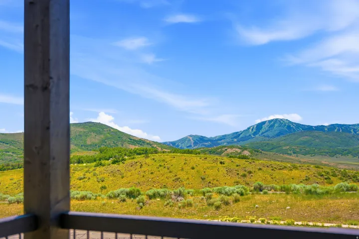 Expansive mountainous landscape with natural vegetation