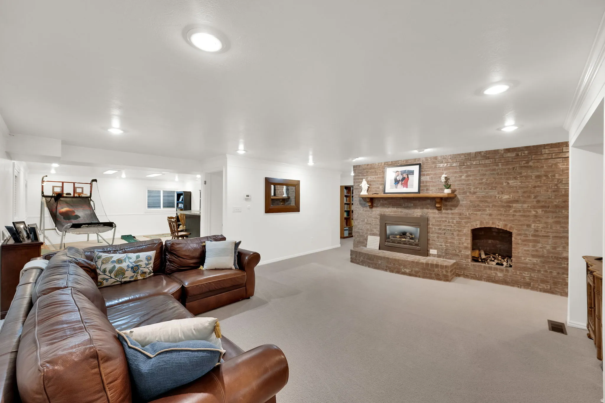 Basement family room with cozy fireplace