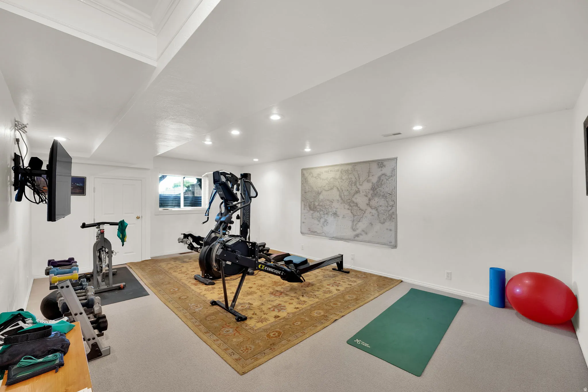 Spacious bonus/exercise room featuring recessed lighting