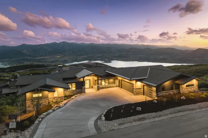 Contemporary architectural design featuring stone and wood-look siding