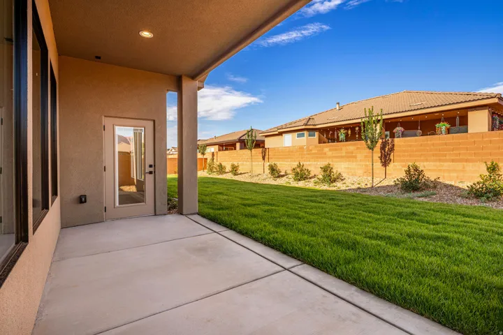 Covered patio featuring recessed lighting and concrete flooring
